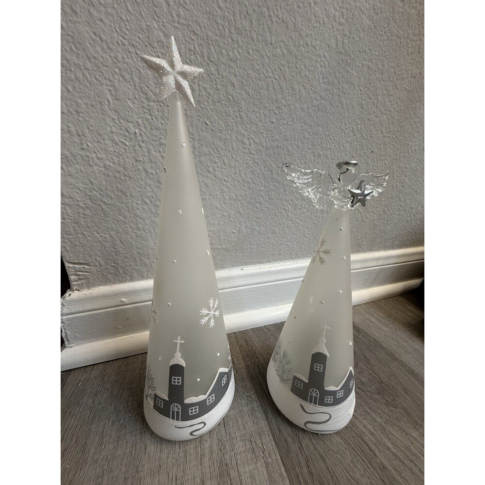 Christmasy frosted glass decorated with a white snowy village scene.